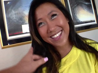 An Asian with pussy fucked takes a black latin dick